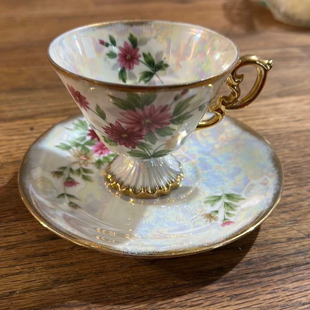 Enesco footed luster teacup and saucer set marked September aster gold trim